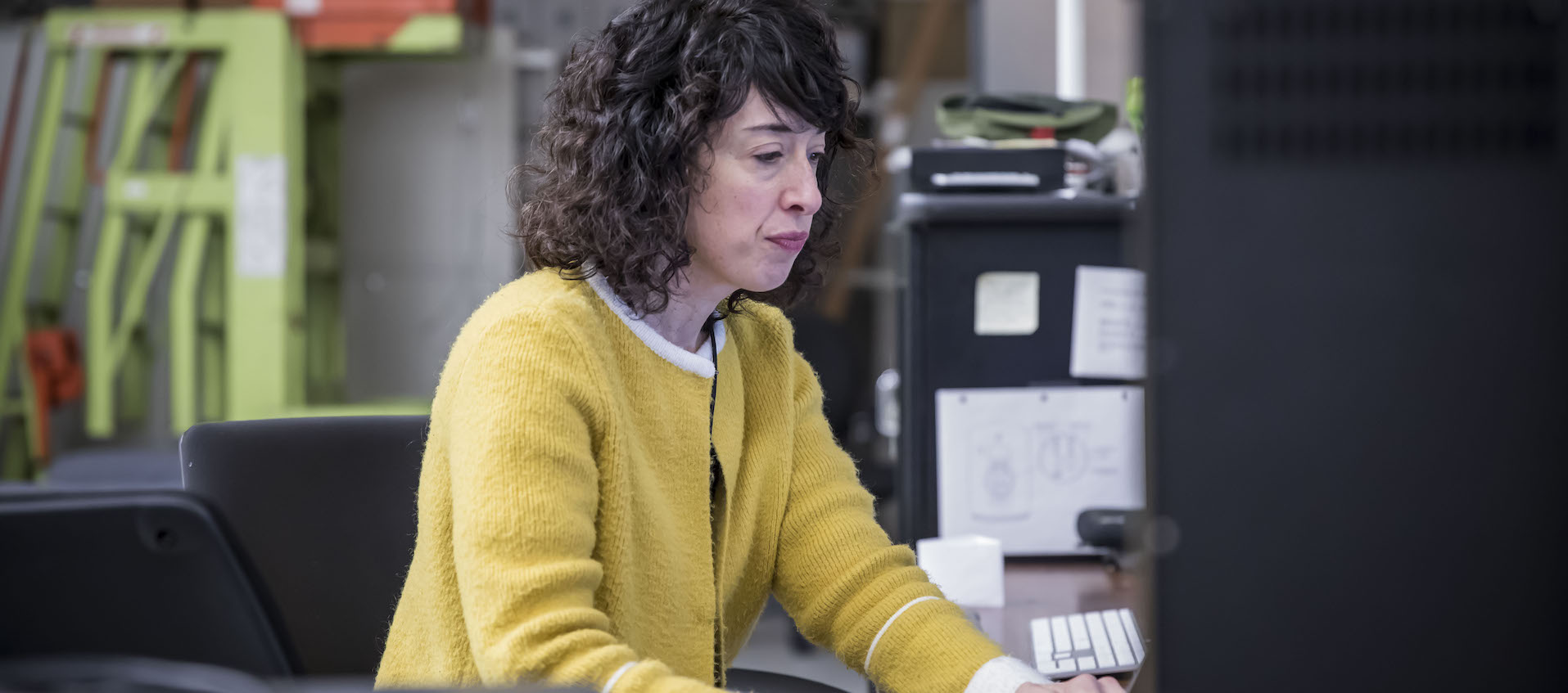 Artist and filmmaker Hope Ginsburg works on her laptop computer in the Wexner Center Film/Video Studio in October 2018.