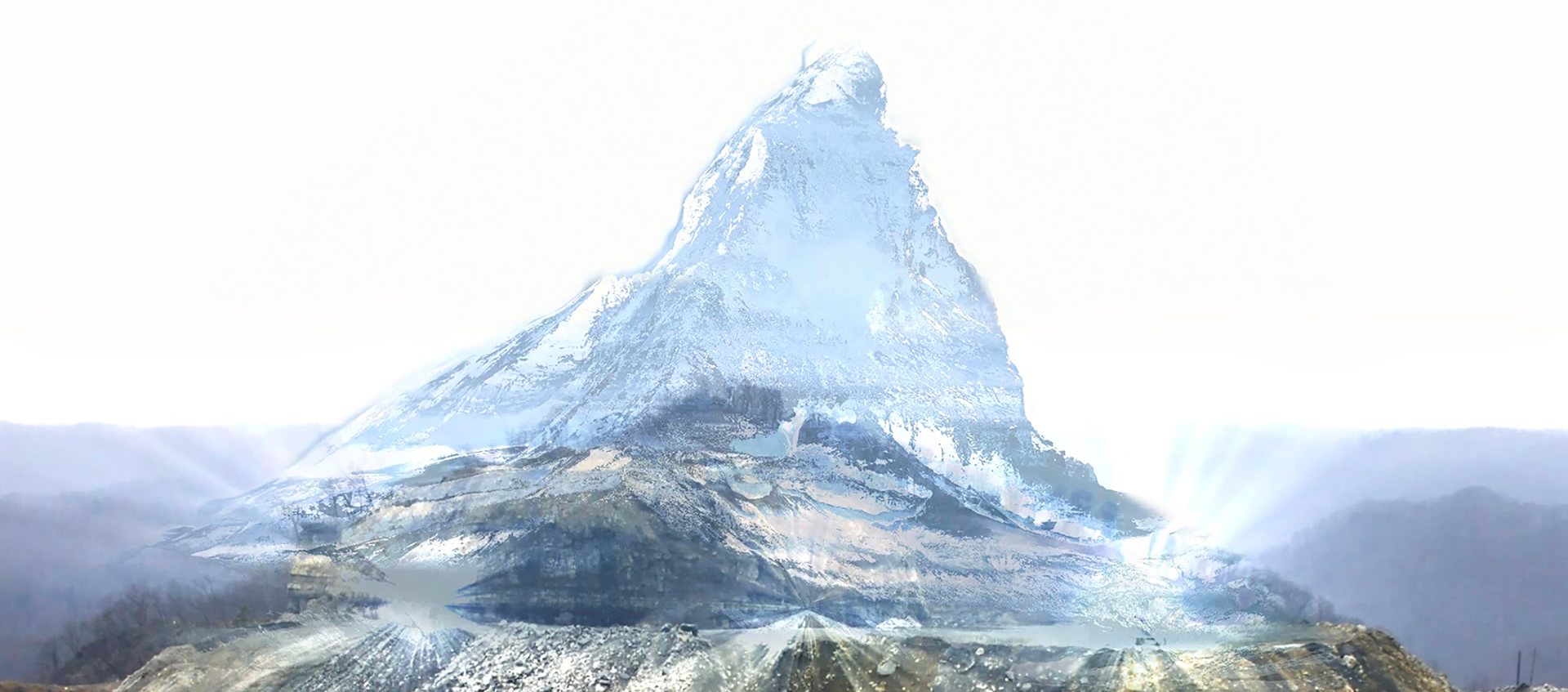 Image of a barren mountain with road cuts and a partially flattened top. A holographic projection of a snowy mountain peak is superimposed over it. 